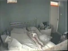 Naked wife masturbates in the bedroom without knowing about a hidden cam 
